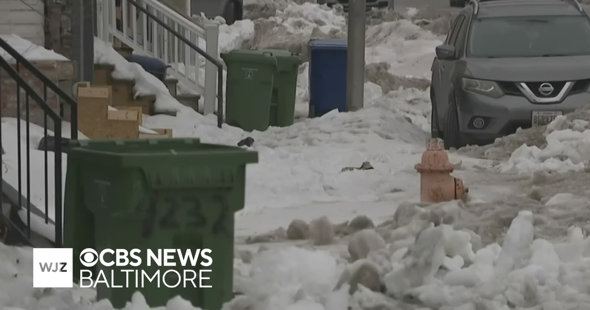 Ice covers many Baltimore sidewalks as arctic cold front moves in, power outage risk across Maryland