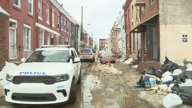 A police car is seen near 15th and Oakdale streets 