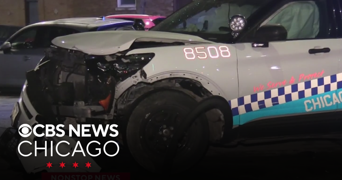 Chicago police squad car hits CTA bus in West Town