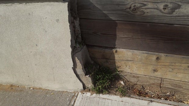 Collapsed retaining wall 