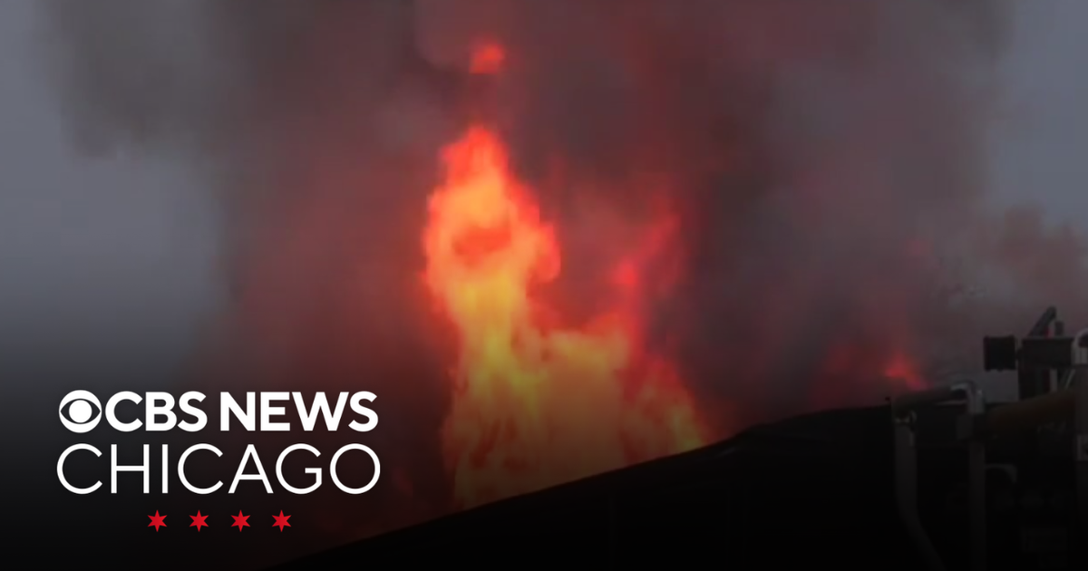 Crews battle large apartment fire in Calumet Park - CBS Chicago