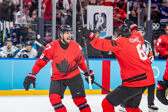 Shea Theodore celebrates his goal during the Finland-Canada men's semifinal match