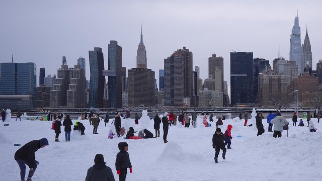 People in New York City enjoy the snow after a major snowstorm hits the city 