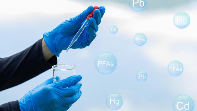 Hands are examining the quality of wastewater treatment systems to control chemicals before releasing water into the environment. Check for contaminants in water sources. Water and ecology concept. 