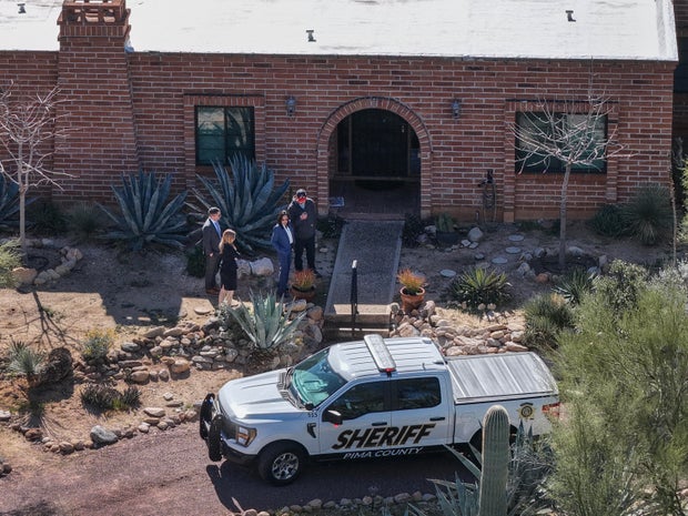 In an aerial view, law enforcement officials visit Nancy Guthrie's residence on Feb. 25, 2026, in Tucson, Arizona.
