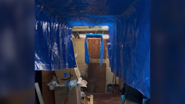 Makeshift shooting range in basement 