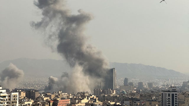 Plumes of smoke rise following reported explosions in Tehran on March 2, 2026, after the U.S. and Israel launched strikes against Iran on Feb. 28 that killed Iran's supreme leader and top military leaders. 