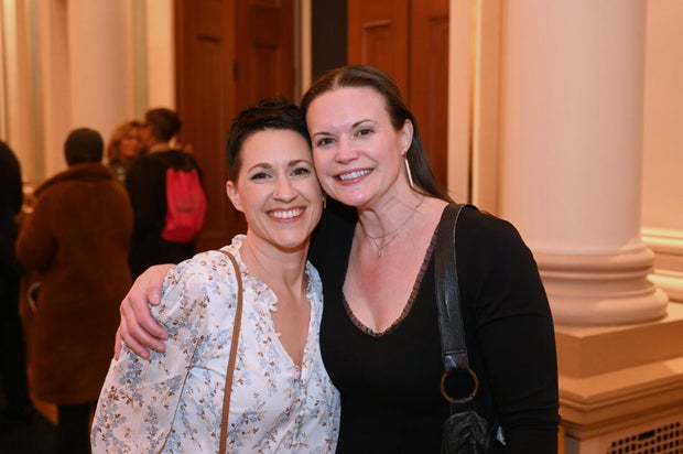 People post for photos at Alvin Ailey American Dance Theater Party at Ensemble Arts 