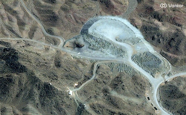 A satellite image shows a closer view of a destroyed vehicle at the Pickaxe Mountain facility in Natanz 