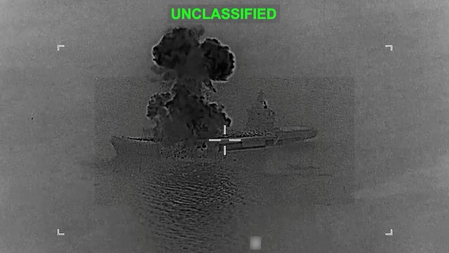 Smoke rises from what U.S. Central Command says is an Iranian drone carrier that was struck by U.S. forces at an unknown location, in this screen grab taken from a handout video released on March 5, 2026. 