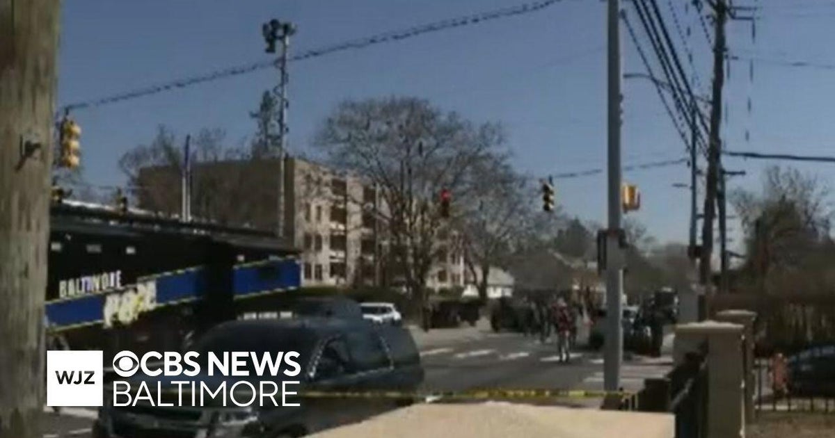 Baltimore officer shot, suspect killed during hostage situation - CBS ...