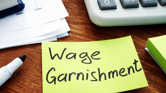 Wage Garnishment written on the yellow sheet. 