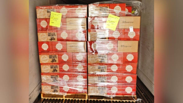 Palletized boxes of packaged walnuts 