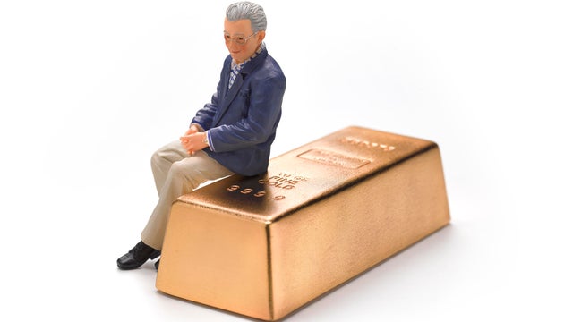 Wedding Figurine Retired Man sitting on gold bar 