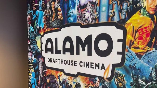 A sign for  Alamo Drafthouse Cinema 