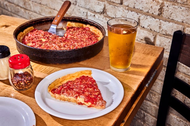 Sausage deep dish and a Miller Lite at Lou Malnati's in Lincoln 