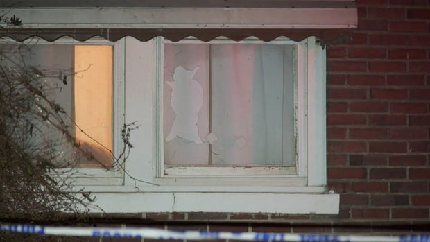Shattered window at Staten Island home 