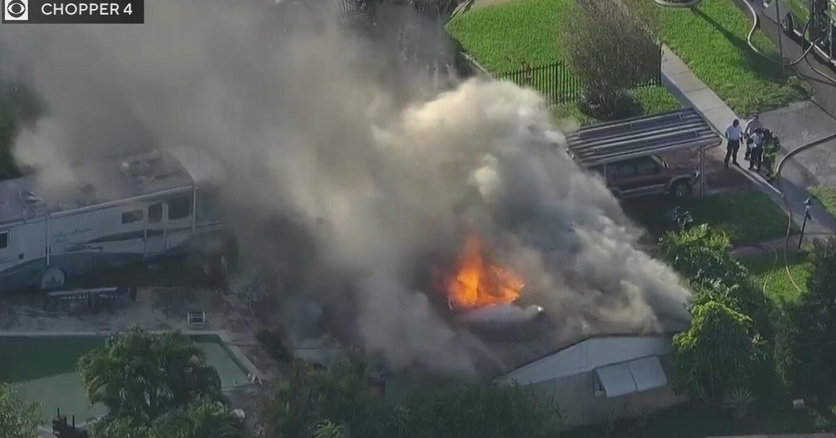 Miami Gardens home engulfed in flames as crews work to put it out