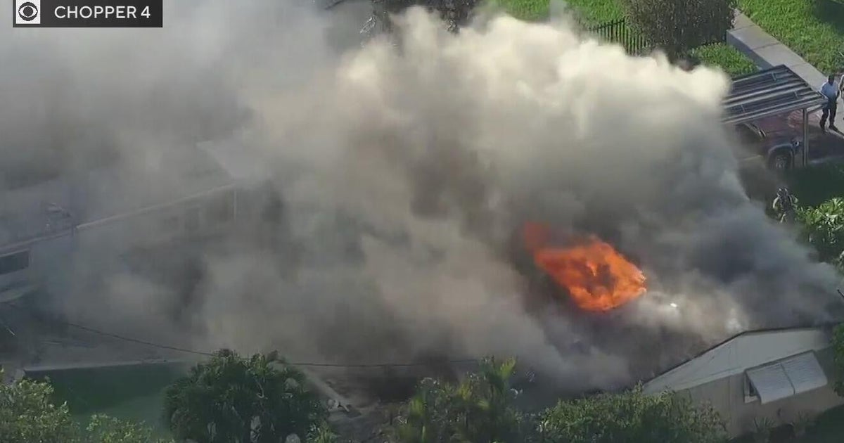 Miami Gardens house fire causes huge billows of smoke in the area as crews work to put it out