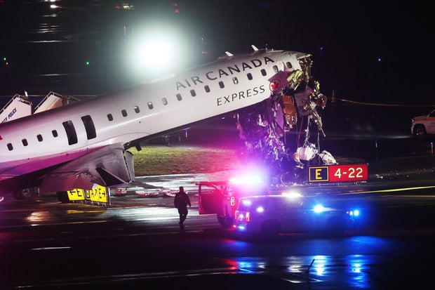 Air Canada Express Plane Collides With Fire Truck At LaGuardia Airport 