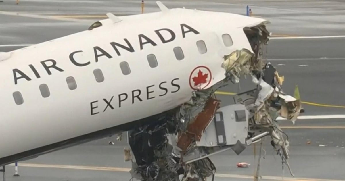 Investigation underway after plane slams into fire-rescue truck while landing at LaGuardia