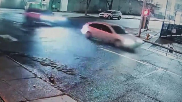 Close Up Shot Focused on Yellow Tape Showing Text Police Line Do Not Cross. Restricted Area of a Crime Scene. Bokeh Background with Flickering Siren Lights. Forensics Team Working on a Case 