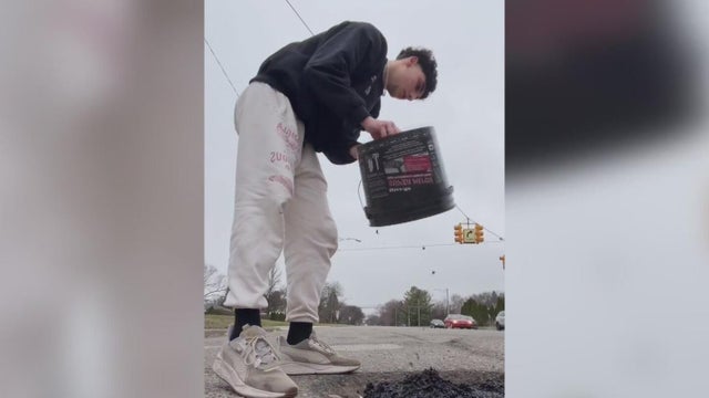 Viral video shows Dearborn Heights man fixing pothole 