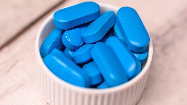 Blue Pills in Plastic Cap &ndash; Clean Pharmaceutical Product Shot 