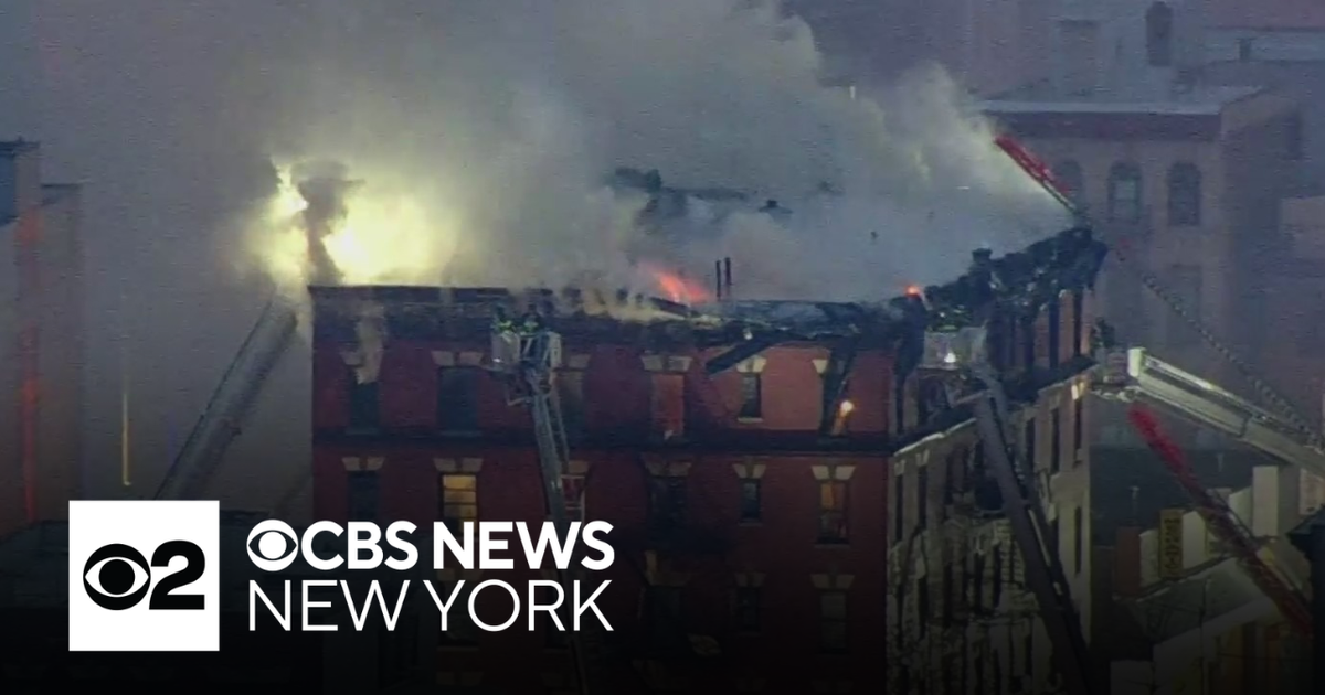 FDNY battling massive 5-alarm fire at Bronx apartment building - CBS ...