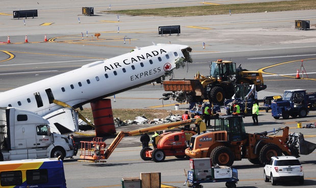 Air Canada Express Plane Collides With Fire Truck At LaGuardia Airport 