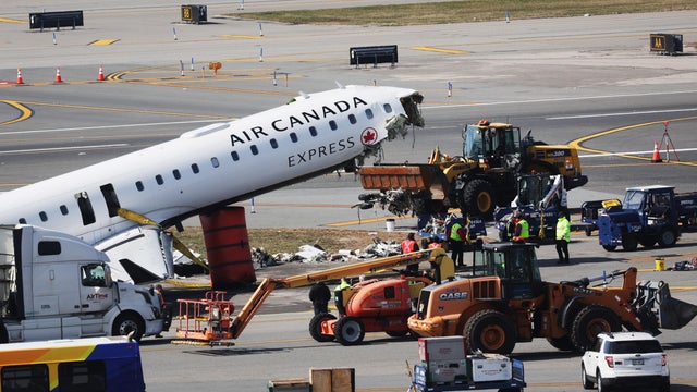Air Canada Express Plane Collides With Fire Truck At LaGuardia Airport 