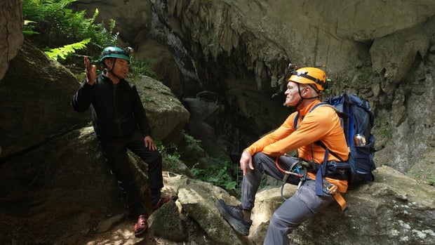 Ho Khanh and Scott Pelley