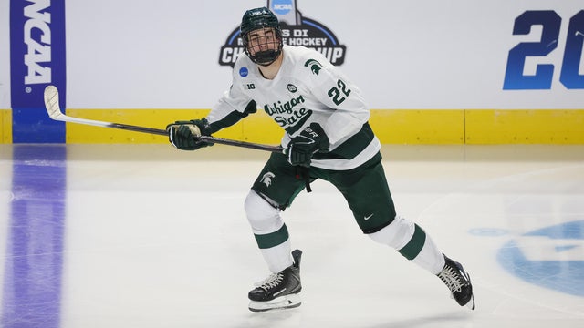 Porter Martone of Michigan State skates during a NCAA semifinal game against UConn 