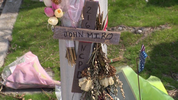 Makeshift cross honoring John Miro 