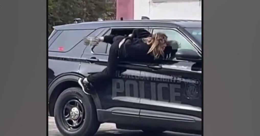 Woman climbs out of patrol car to escape Muskegon Heights police - CBS ...