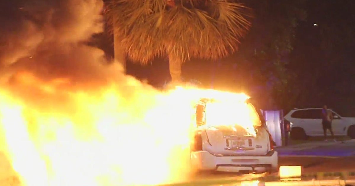 Miami driver crawls out of burning car after crash early Tuesday morning