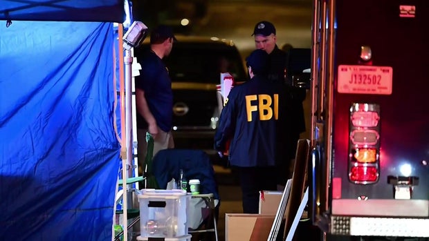 FBI officials on Odell Avenue