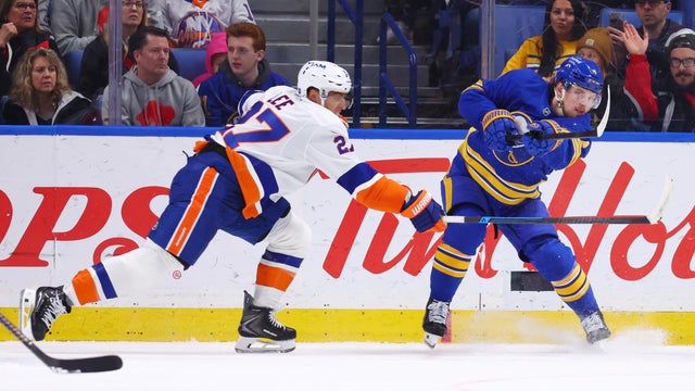 Bowen Byram #4 of the Buffalo Sabres scores an empty net goal during an NHL game against the New York Islanders on March 31, 2026 at KeyBank Center in Buffalo, New York. Buffalo won, 4-2. 