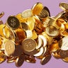 Digitally generated image of abstract background with gold dollar coins 