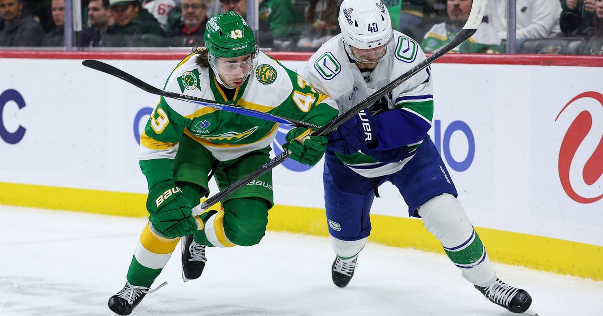 Wild wrap up a playoff spot with 5-2 victory over the Canucks