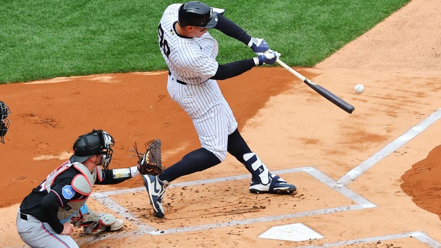 Aaron Judge #99 of the New York Yankees hits a two run home run during the first inning of the game against the Miami Marlins on April 3, 2026 at Yankee Stadium in the Bronx, New York. 