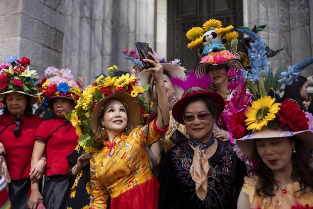 People take part in the annual Easter Parade and Bonnet Festival on Fifth Avenue between 49th and 57th Streets on Easter Sunday, April 20, 2025 in New York City, United States.
