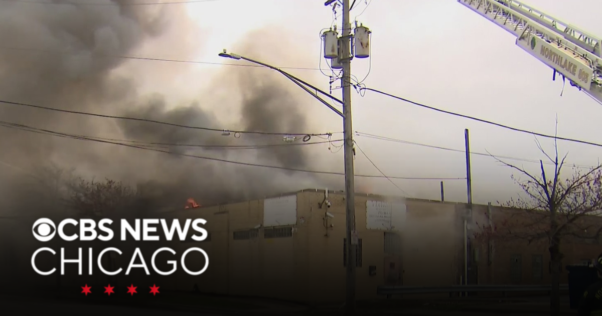 Fire crews monitor for hotspots after warehouse fire in Maywood - CBS ...