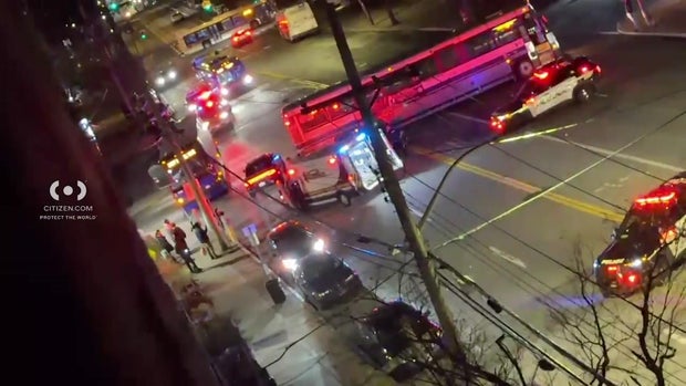 Bus in middle of multiple lanes of traffic 