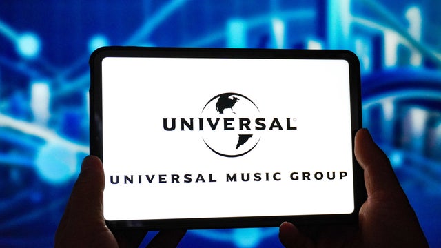 In this photo illustration, the Universal Music Group logo 