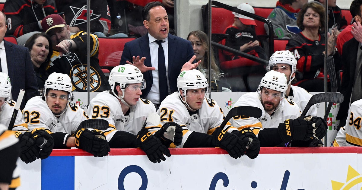 Hurricanes top Bruins in OT to claim the Metropolitan Division title