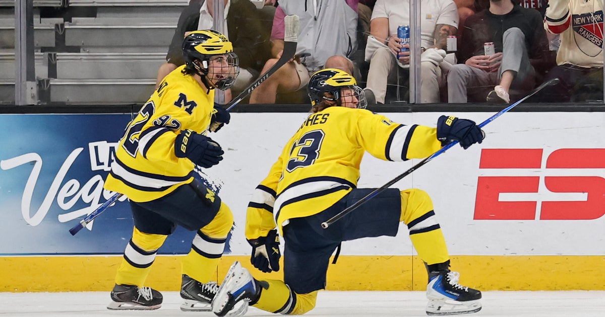 Second overtime score lifts Denver past Michigan 4-3 in Frozen Four thriller