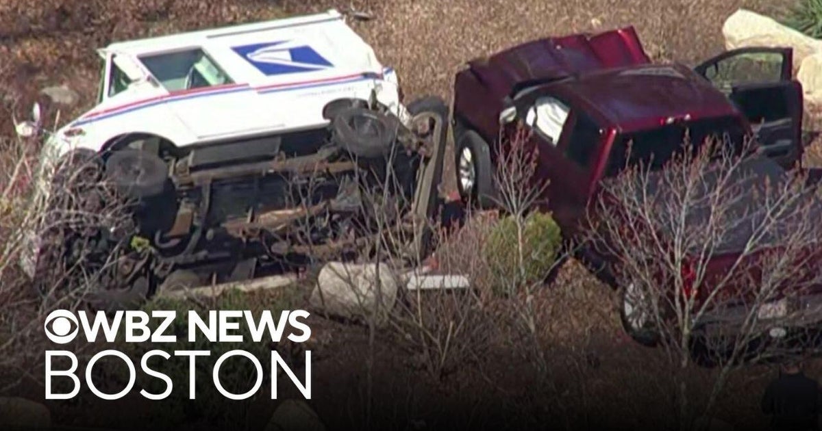 Postal worker pinned under mail truck after Massachusetts crash - CBS ...
