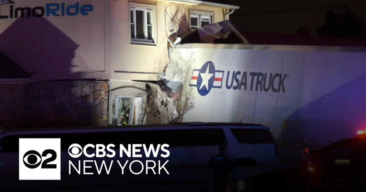 Truck crashes into building in Clifton, New Jersey