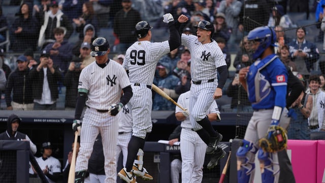 New York Yankees Designated Hitter Ben Rice (22) congratulates New York Yankees Right Fielder Aaron Judge (99) for hitting a two run home run during the first inning of a Major League Baseball game between the Kansas City Royals and the New York Yankees on April 19, 2026, at Yankee Stadium in The Bronx, NY. 